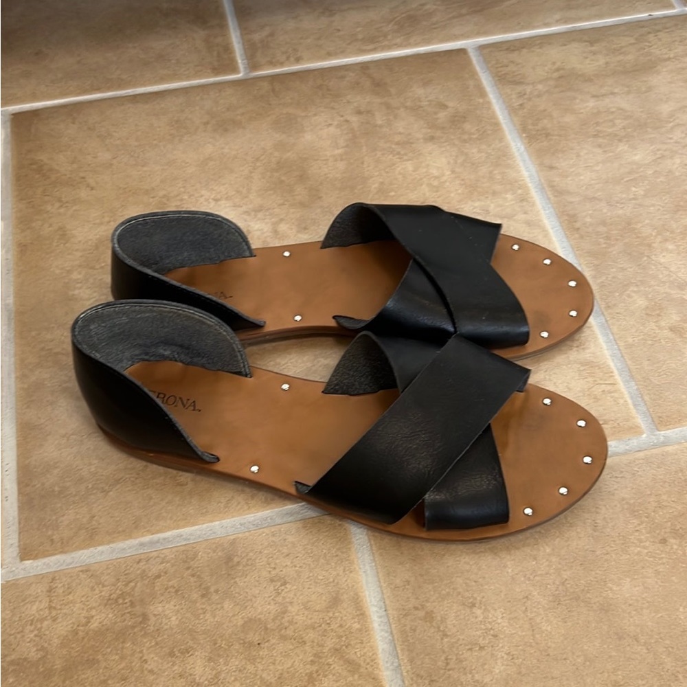 Black leather crossover sandals
